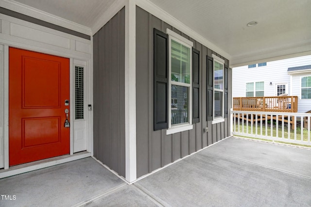 1017 Blackpool Ct, Apex, NC 27502 - entrance to property featuring covered porch and board and batten siding