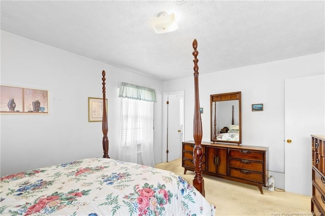 1319 Levy Dr, Fayetteville, NC 28305 - bedroom featuring light carpet and a textured ceiling