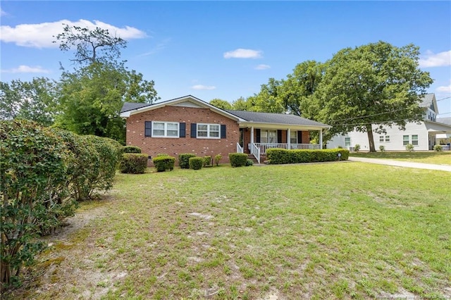 1319 Levy Dr, Fayetteville, NC 28305 - ranch-style house with a porch, a front yard, and brick siding