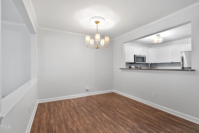 1210 Westview Ln Unit 203, Raleigh, NC 27605 - unfurnished dining area featuring a chandelier, dark wood-type flooring, and crown molding