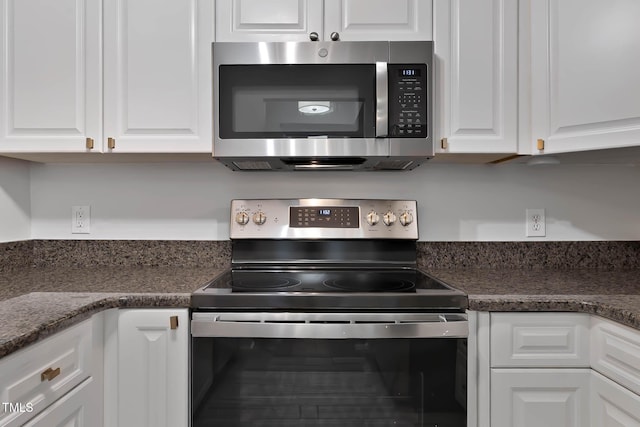 1210 Westview Ln Unit 203, Raleigh, NC 27605 - kitchen featuring appliances with stainless steel finishes and white cabinets