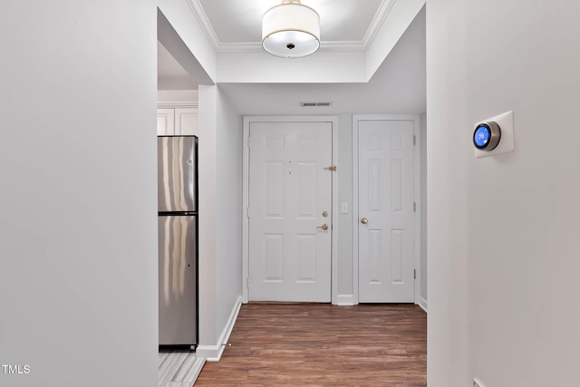 1210 Westview Ln Unit 203, Raleigh, NC 27605 - entrance foyer with wood finished floors and ornamental molding