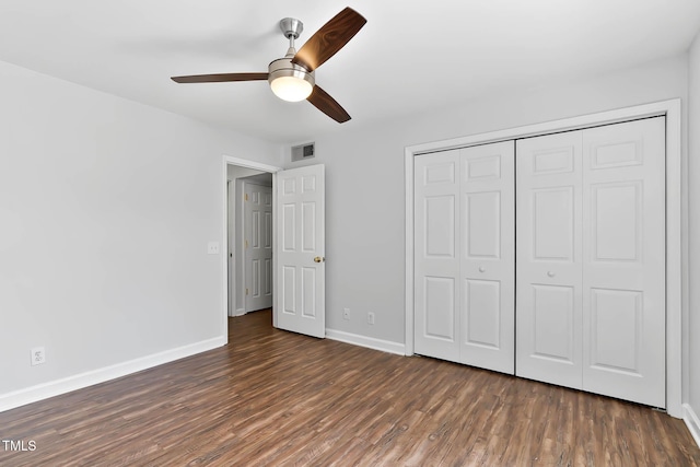 1210 Westview Ln Unit 203, Raleigh, NC 27605 - unfurnished bedroom with wood finished floors, a closet, and a ceiling fan