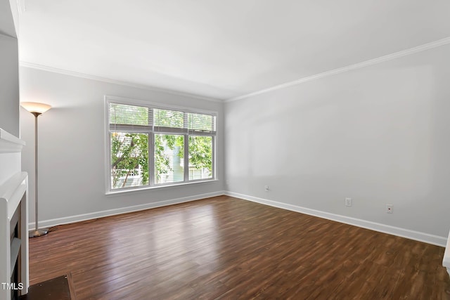 1210 Westview Ln Unit 203, Raleigh, NC 27605 - unfurnished living room featuring ornamental molding, a fireplace, and dark wood-style floors