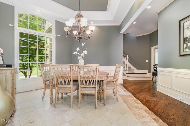 3712 Highland Creek Dr, Apex, NC 27539 - dining room featuring ornamental molding, a chandelier, a decorative wall, stairway, and recessed lighting