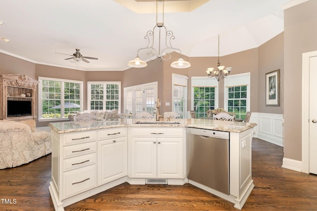 3712 Highland Creek Dr, Apex, NC 27539 - kitchen featuring stainless steel dishwasher, open floor plan, ceiling fan, a chandelier, and light stone countertops