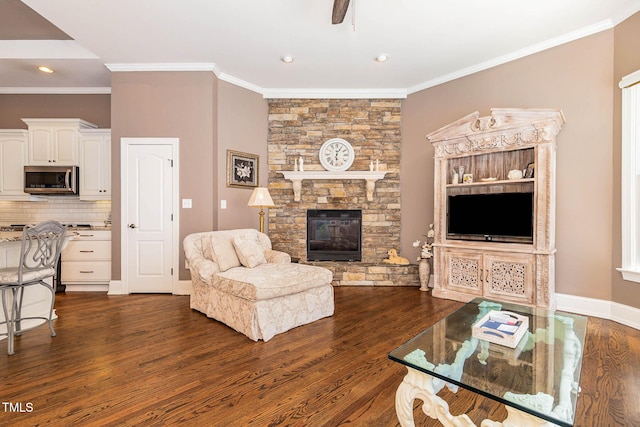 3712 Highland Creek Dr, Apex, NC 27539 - living room with dark wood finished floors, a fireplace, crown molding, ceiling fan, and recessed lighting