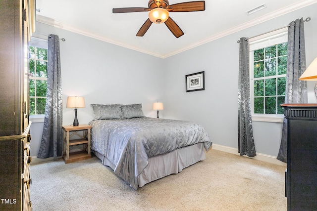 3712 Highland Creek Dr, Apex, NC 27539 - carpeted bedroom with multiple windows, ornamental molding, and ceiling fan