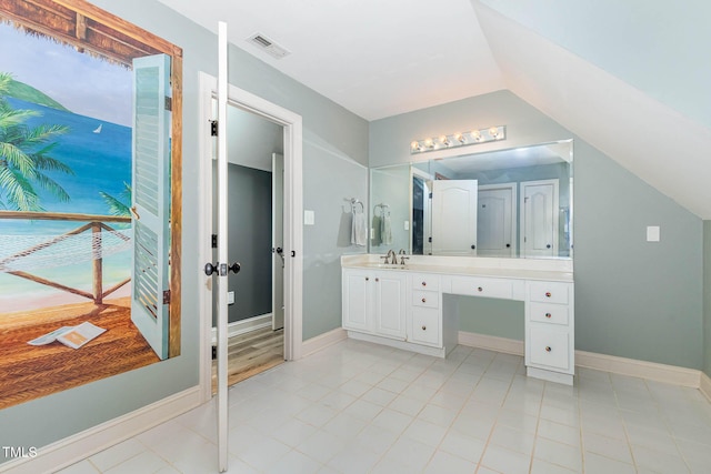 3712 Highland Creek Dr, Apex, NC 27539 - bathroom featuring vanity, tile patterned floors, and vaulted ceiling