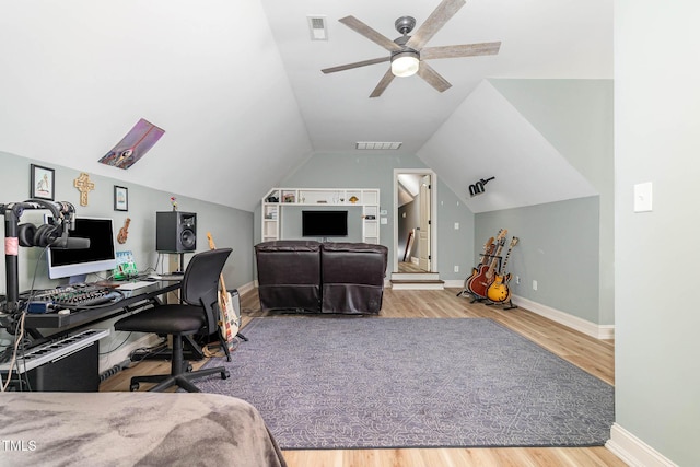 3712 Highland Creek Dr, Apex, NC 27539 - office area with wood finished floors, a ceiling fan, and lofted ceiling
