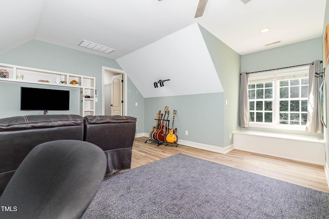 3712 Highland Creek Dr, Apex, NC 27539 - living room featuring wood finished floors, lofted ceiling, and ceiling fan