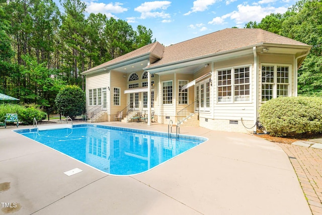 3712 Highland Creek Dr, Apex, NC 27539 - swimming pool featuring entry steps, a patio area, and french doors