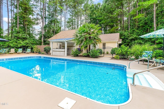 3712 Highland Creek Dr, Apex, NC 27539 - view of pool featuring a patio and view of scattered trees