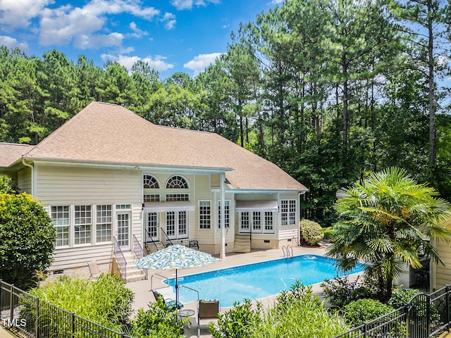 3712 Highland Creek Dr, Apex, NC 27539 - view of swimming pool featuring french doors, an exterior structure, a patio area, and an outdoor structure