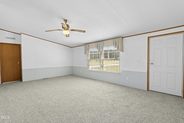 889 Pollock Rd, Kenly, NC 27542 - spare room featuring a ceiling fan and carpet