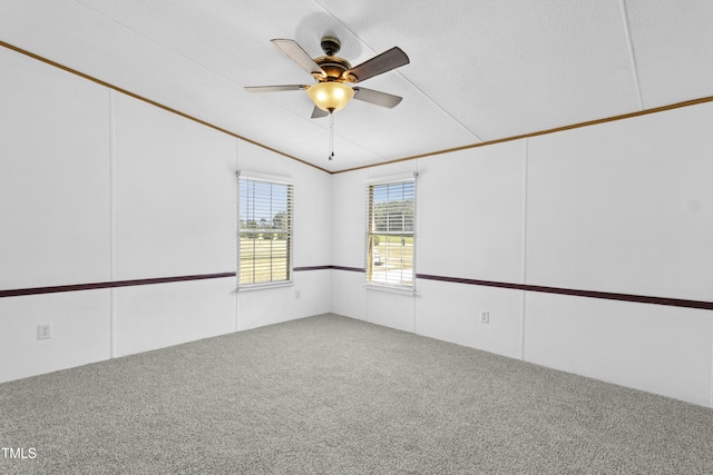 889 Pollock Rd, Kenly, NC 27542 - unfurnished room featuring carpet floors, ceiling fan, and vaulted ceiling
