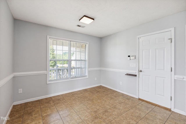 193 Checkmate Ct, Cameron, NC 28326 - empty room with baseboards and light tile patterned floors