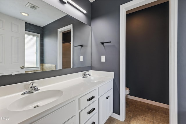 193 Checkmate Ct, Cameron, NC 28326 - bathroom featuring double vanity and tile patterned floors