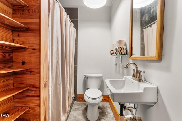 2419 Hodges Rd, Burlington, NC 27217 - bathroom featuring toilet and a shower with curtain