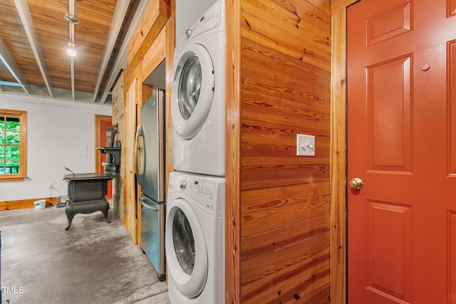 2419 Hodges Rd, Burlington, NC 27217 - laundry area featuring estacked washer and dryer and wooden ceiling