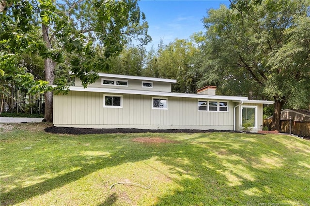 1814 Sunnyside Cir, Fayetteville, NC 28305 - rear view of house featuring a chimney