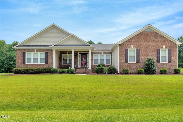 1421 Hopson Downs Ct, Holly Springs, NC 27540 - view of front of house with brick siding and a front lawn