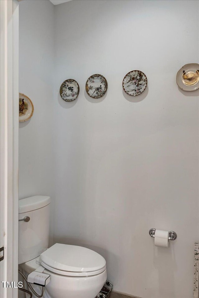 1421 Hopson Downs Ct, Holly Springs, NC 27540 - bathroom with toilet