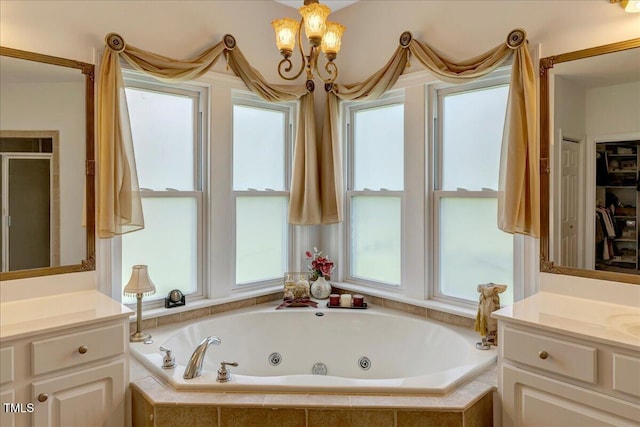 1421 Hopson Downs Ct, Holly Springs, NC 27540 - bathroom with vanity, a tub with jets, a chandelier, and a shower stall