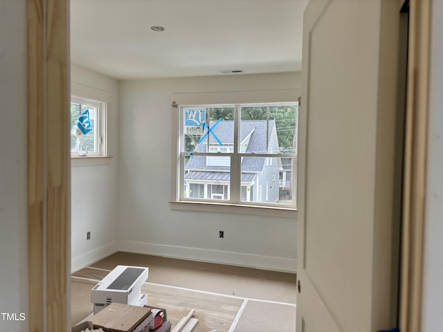 2658 Lawndale Ave, Durham, NC 27705 - empty room with baseboards and wood finished floors