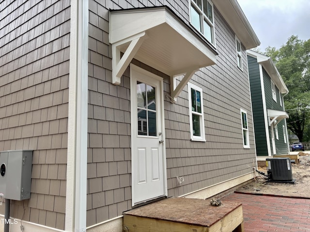 2658 Lawndale Ave, Durham, NC 27705 - view of property exterior with a central air condition unit and a patio area