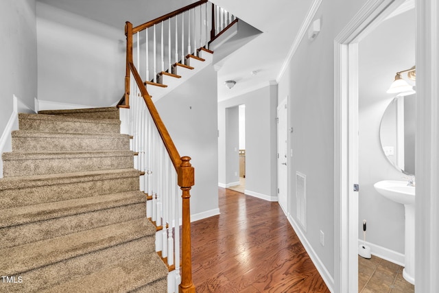 5515 S Roxboro St Unit 3, Durham, NC 27713 - stairway with crown molding and wood finished floors