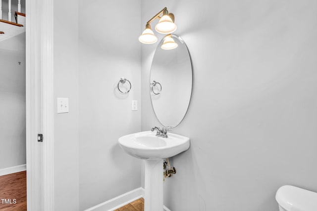 5515 S Roxboro St Unit 3, Durham, NC 27713 - bathroom featuring toilet and wood finished floors