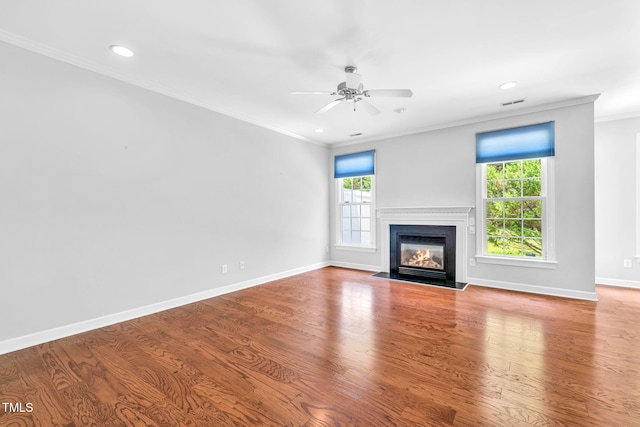 5515 S Roxboro St Unit 3, Durham, NC 27713 - unfurnished living room with plenty of natural light, ornamental molding, a ceiling fan, recessed lighting, and wood finished floors