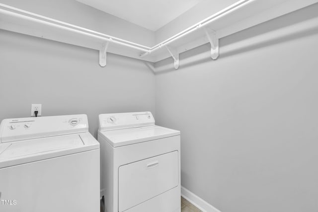 5515 S Roxboro St Unit 3, Durham, NC 27713 - washroom with washer and dryer and baseboards