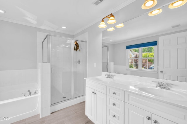 5515 S Roxboro St Unit 3, Durham, NC 27713 - full bathroom with a stall shower, crown molding, a bath, double vanity, and recessed lighting