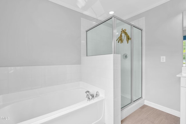 5515 S Roxboro St Unit 3, Durham, NC 27713 - bathroom featuring a bath, a shower stall, ornamental molding, and recessed lighting