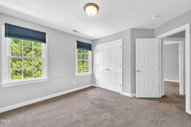 5515 S Roxboro St Unit 3, Durham, NC 27713 - unfurnished bedroom with carpet floors and a closet