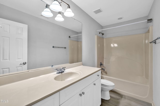 5515 S Roxboro St Unit 3, Durham, NC 27713 - full bathroom with vanity,  shower combination, and wood finished floors