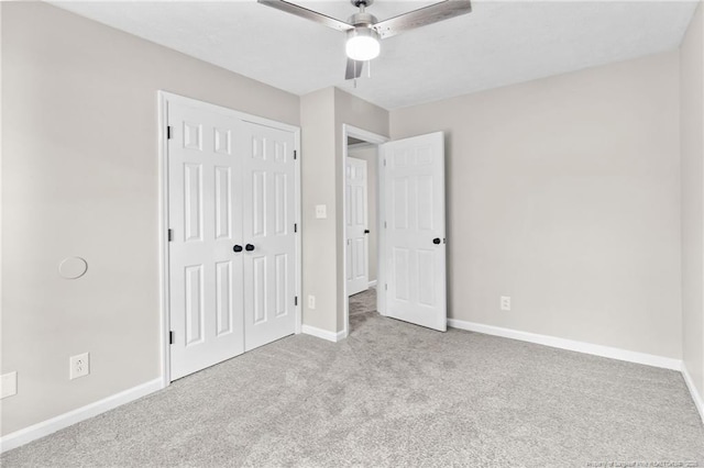 806 Eagle Landing Dr, Hope Mills, NC 28348 - unfurnished bedroom featuring carpet, a closet, and ceiling fan