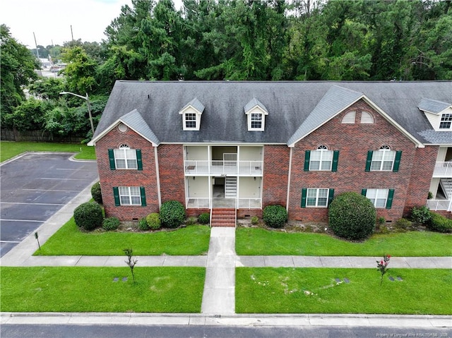 3401 Lainey Ln Unit D, Fayetteville, NC 28314 - view of front of house with brick siding, crawl space, and a front lawn
