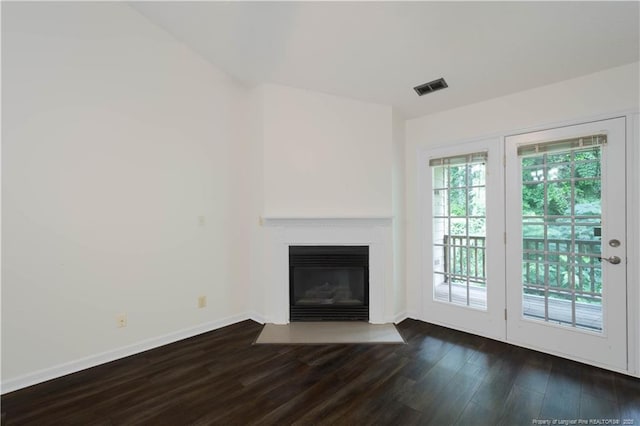3401 Lainey Ln Unit D, Fayetteville, NC 28314 - unfurnished living room featuring dark wood-style floors and a fireplace with flush hearth