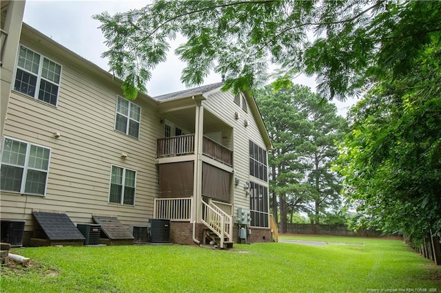3401 Lainey Ln Unit D, Fayetteville, NC 28314 - back of house featuring a balcony