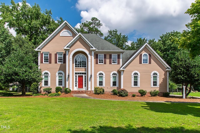 2464 Village Of Wakefield Dr, Zebulon, NC 27597 - view of front facade with a front lawn