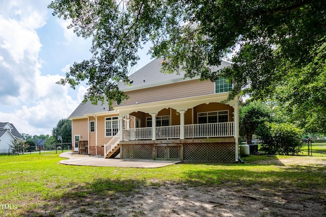 2464 Village Of Wakefield Dr, Zebulon, NC 27597 - rear view of property with stairs, covered porch, and a patio