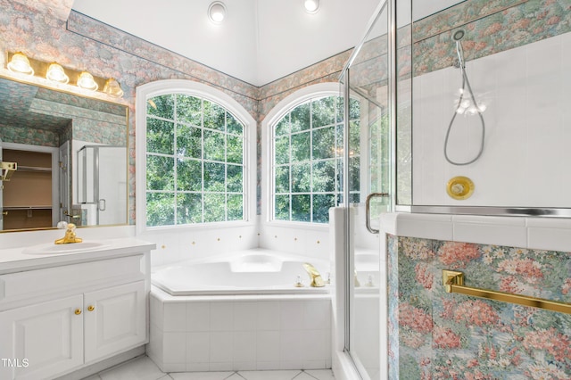 2464 Village Of Wakefield Dr, Zebulon, NC 27597 - full bathroom featuring vanity, a bath, a shower stall, and tile patterned flooring