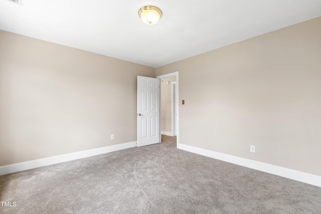 2464 Village Of Wakefield Dr, Zebulon, NC 27597 - empty room featuring carpet flooring and baseboards