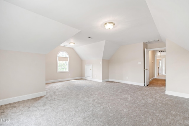 2464 Village Of Wakefield Dr, Zebulon, NC 27597 - bonus room featuring carpet and vaulted ceiling