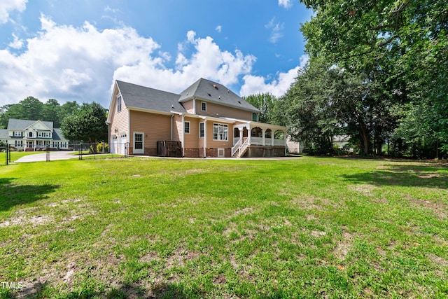 2464 Village Of Wakefield Dr, Zebulon, NC 27597 - back of house featuring a lawn