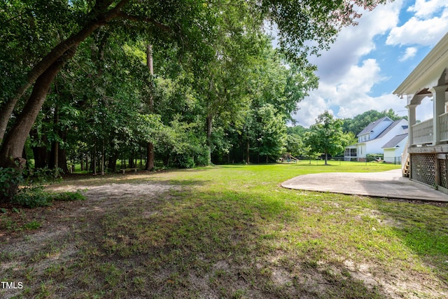 2464 Village Of Wakefield Dr, Zebulon, NC 27597 - view of green lawn with a patio