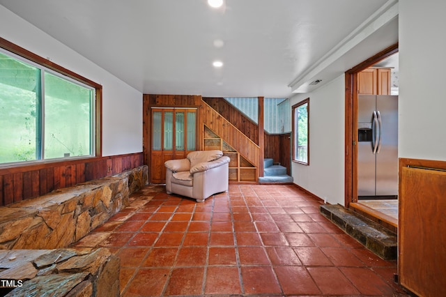 1310 Martin Luther King Pkwy, Durham, NC 27707 - living area with wooden walls, stairway, wainscoting, and recessed lighting